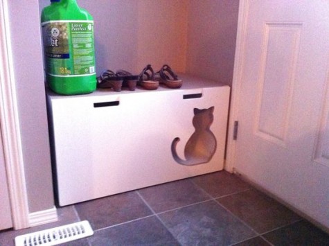 Stuva cabinets with a cutout and a cat litter box inside