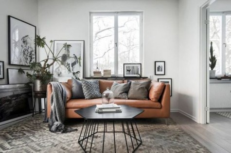 a brown leather sofa can be a nice fit for a Scandinavian space