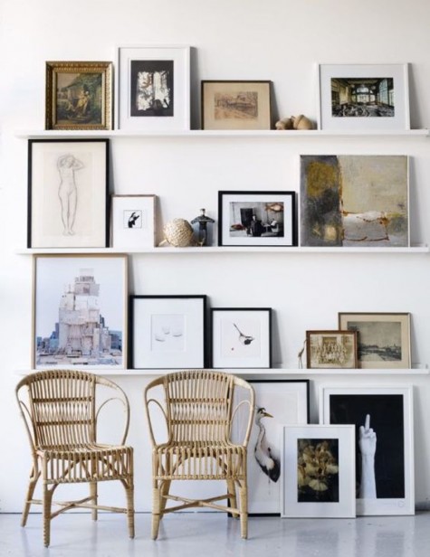 a gorgeous gallery wall with very catchy works of art