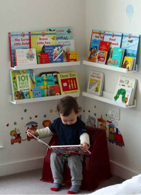 a kid_s reading nook with IKEA Ribba ledges