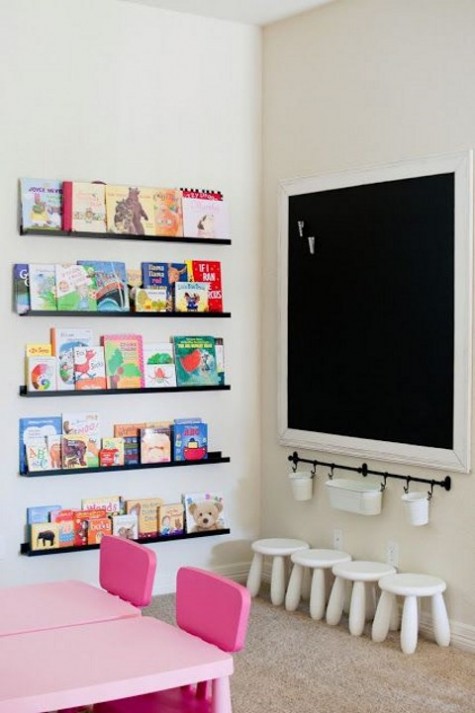 a kid_s reading nook with black Ribba ledges