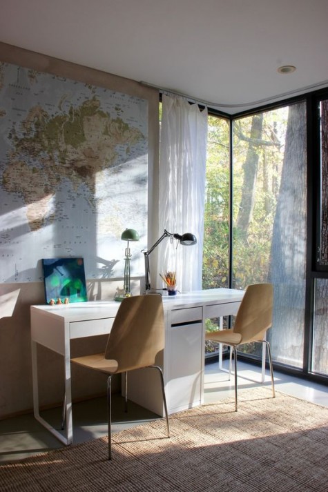 a modern shared work and study space with two Micke desks