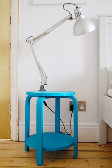 a bold blue IKEA Frosta stool with a shelf
