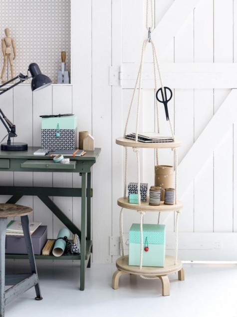 a hanging three tier shelving unit made of IKEA Frosta stools