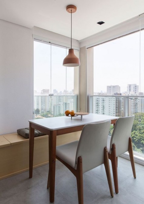 a bench with storage space inside for a small dining room
