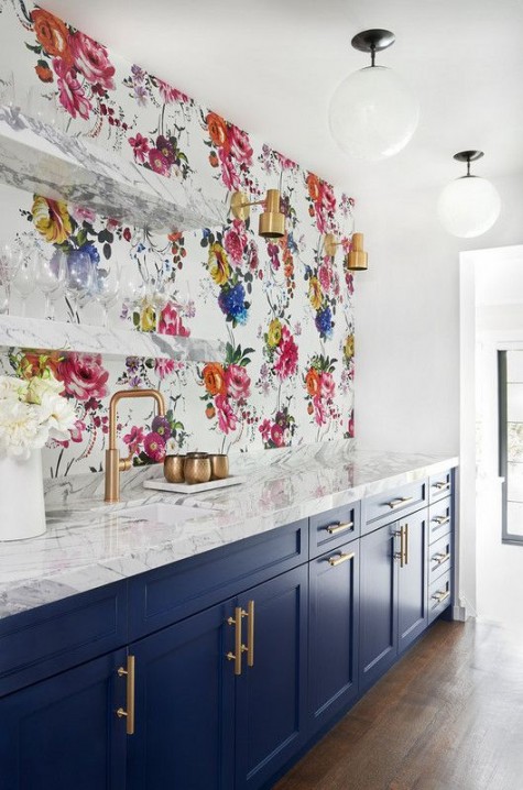 bright floral wallpaper for a statement wall and backsplash to make your kitchen trendy