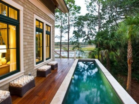 build a deck next to the house and make a long narrow pool next to it