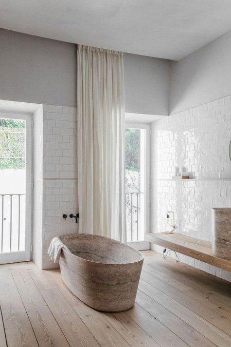 remove all the rugs you don_t need, and if you go for curtains, choose airy and lighter ones