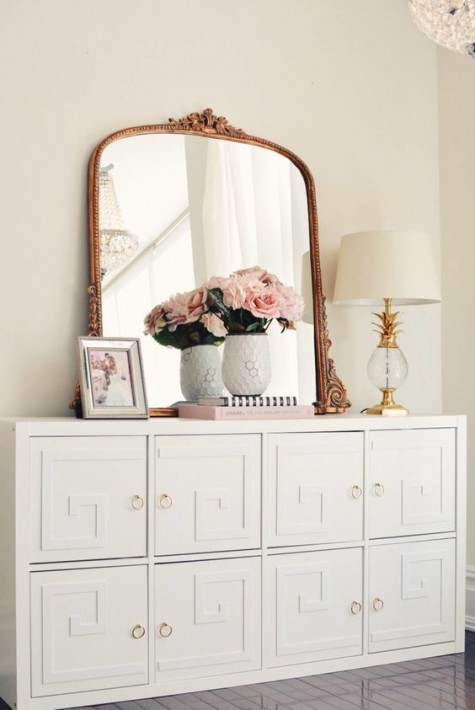 IKEA Malm dresser turned into a chic vintage piece with overlays and brass knobs