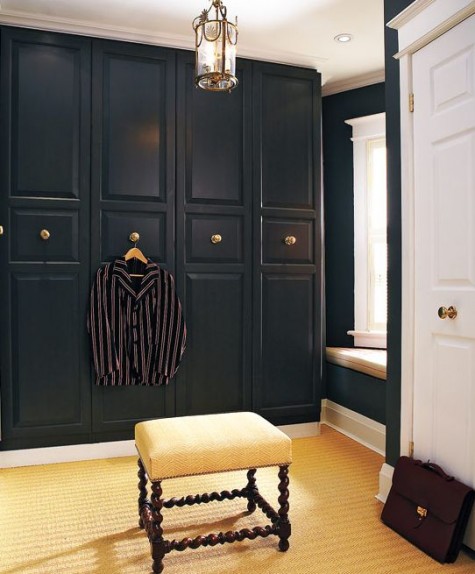 IKEA Pax wardrobe in black with gilded knobs looks very chic and art deco