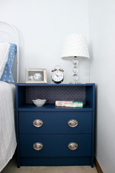 IKEA Rast dresser painted navy, with contact paper inside and chic metallic knobs