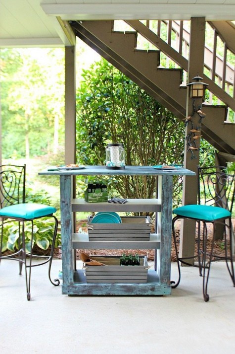 a chic light blue bar station of an IKEA Billy bookcase