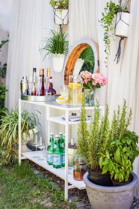 a glam outdoor bar made of an IKEA Micke desk is a genius idea