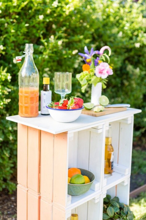 a pastel outdoor bar made of 12 IKEA Knagglig boxes