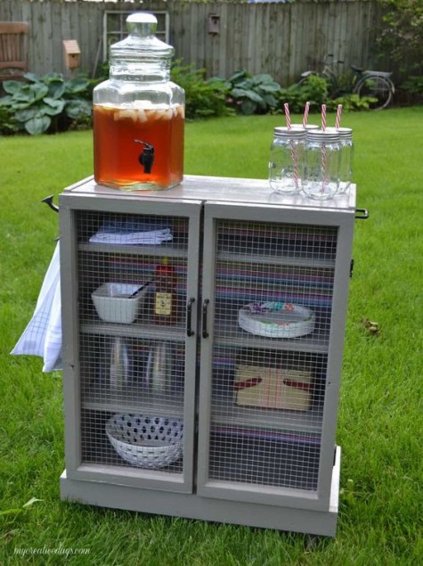 a vintage-inspired beverage unit in grey with mesh doors out of IKEA Malm dresser