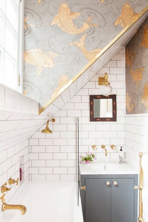 eye-catchy wallpaper with a fish print is right what you need for a stylish bathroom