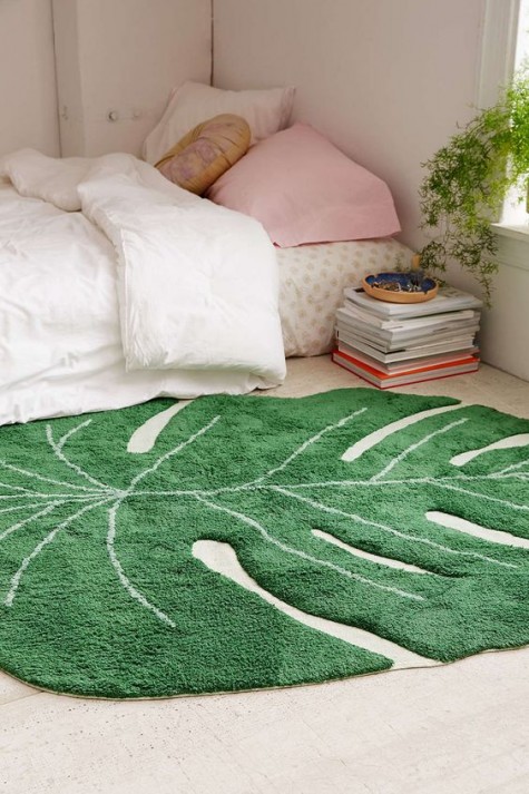 rock a monstera leaf rug to make your space summer-like for a cheap