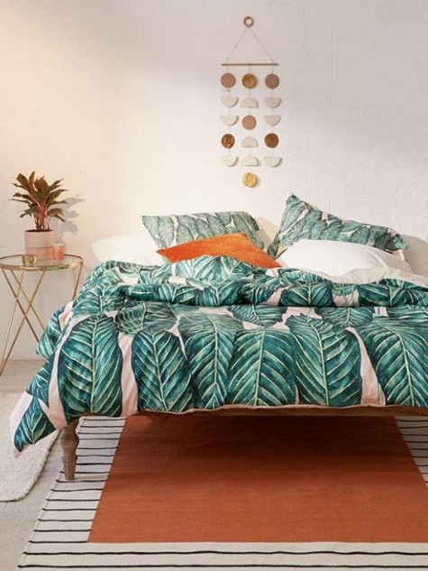 tropical leaf printed bedding is an easy way to add summer cheer to your bedroom
