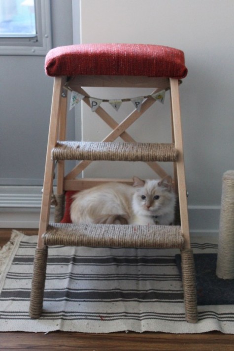 a cat tree with a hammock made of an IKEA Bekvam stool