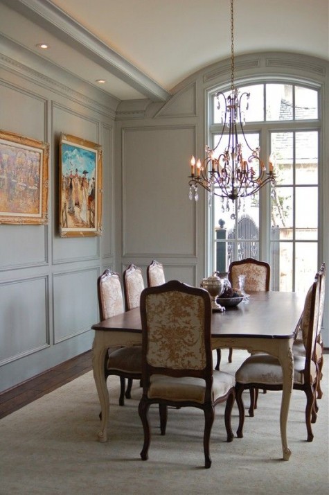 a refined vintage space with light grey wainscoting for a sophisticated feel