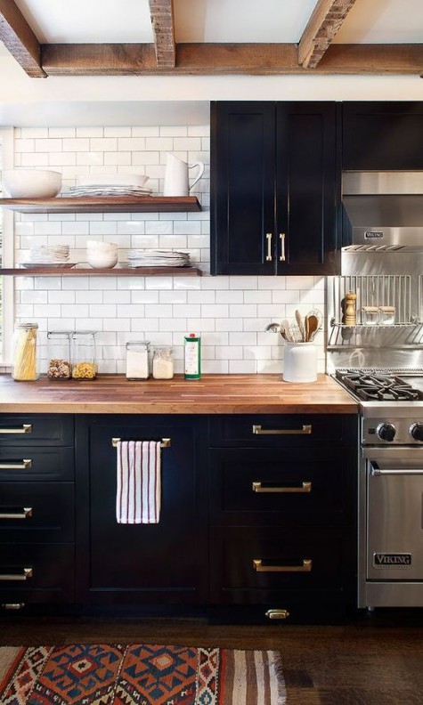 blackcabinets with brass handles look great with butcher block countertops