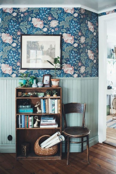 bold floral print wallpaper and aqua wainscoting for a bright and vivacious look