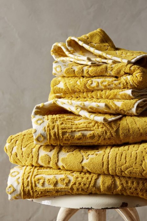 cozy mustard towels will make your bathroom more fall-like