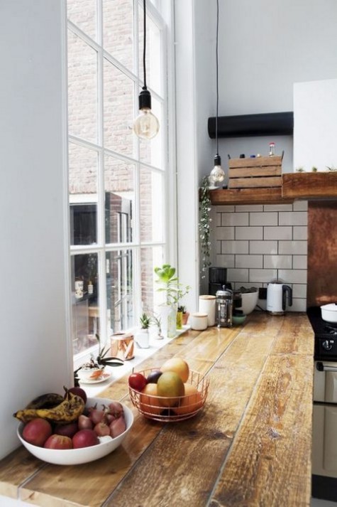 rustic rough wood butcher block countertops for adding a cozy feel