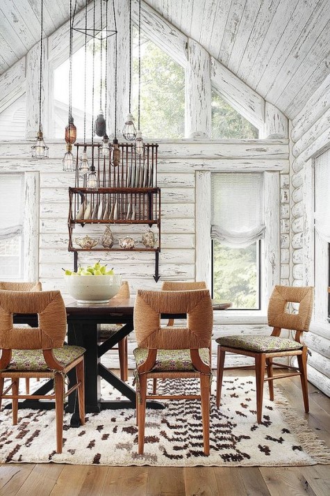 shabby whitewashed wooden walls embrace the relaxed rustic style of the cottage