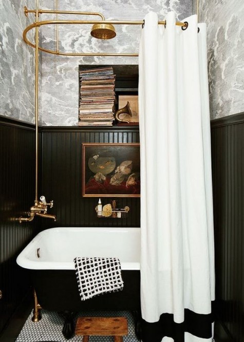 tall black wainscoting and grey printed wallpaper to create a stylish retro bathroom look