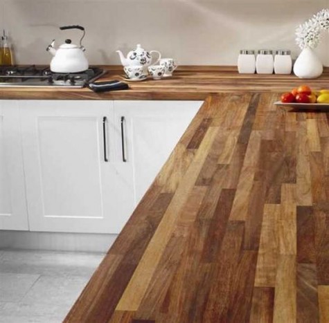 white cabinets with rich-colored butcher block countertops is classics
