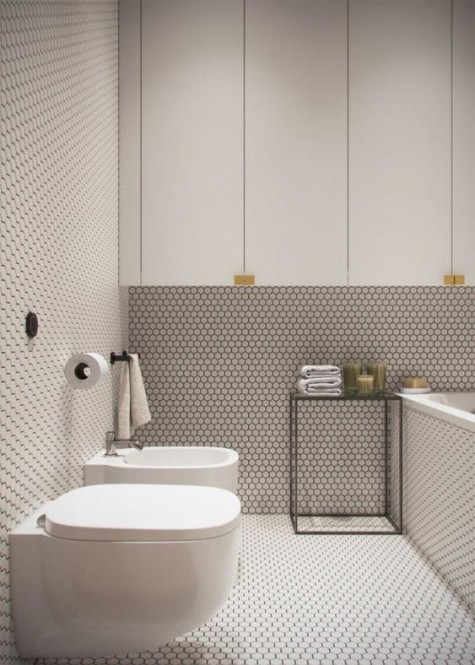 white penny tiles with black grout create a very textural look