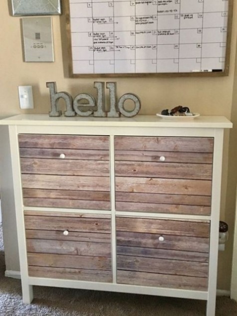 a cozy rustic IKEA Hemnes shoe storage piece done with weathered wooden planks